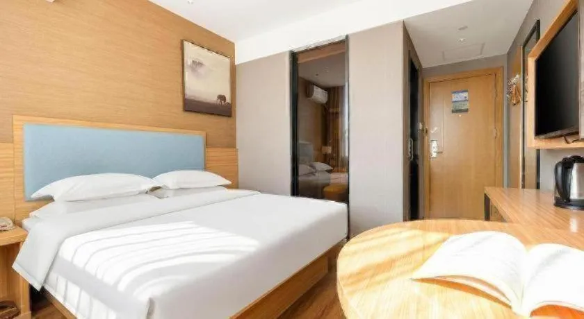 Bed in JTOUR Inn Guigang Life Port High-speed Railway Station