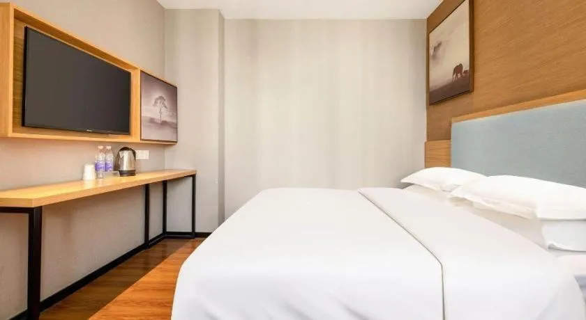 Bed in JTOUR Inn Guigang Life Port High-speed Railway Station