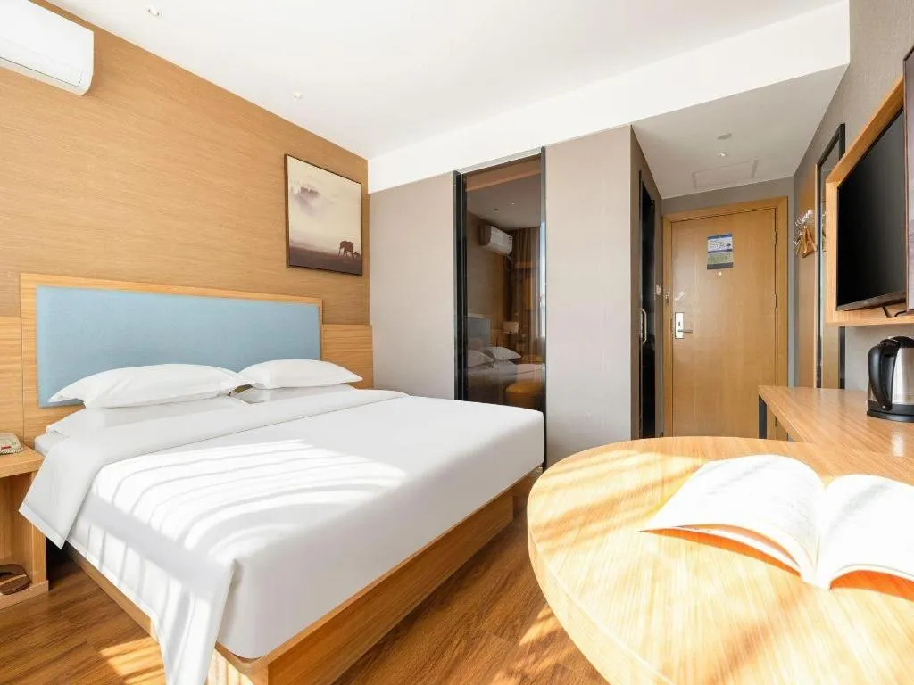 Bed in JTOUR Inn Guigang Life Port High-speed Railway Station