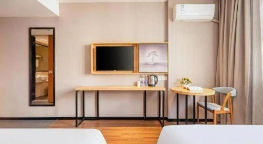 Bed in JTOUR Inn Guigang Life Port High-speed Railway Station