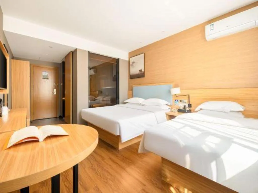 Bed in JTOUR Inn Guigang Life Port High-speed Railway Station