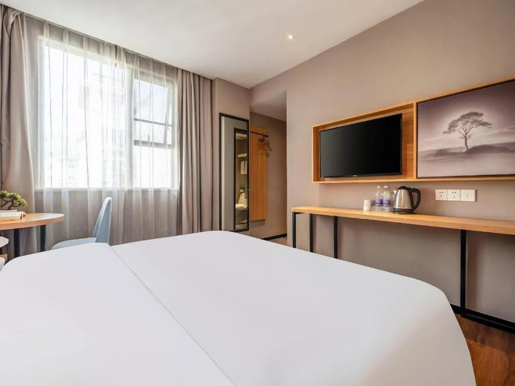 Bed in JTOUR Inn Guigang Life Port High-speed Railway Station