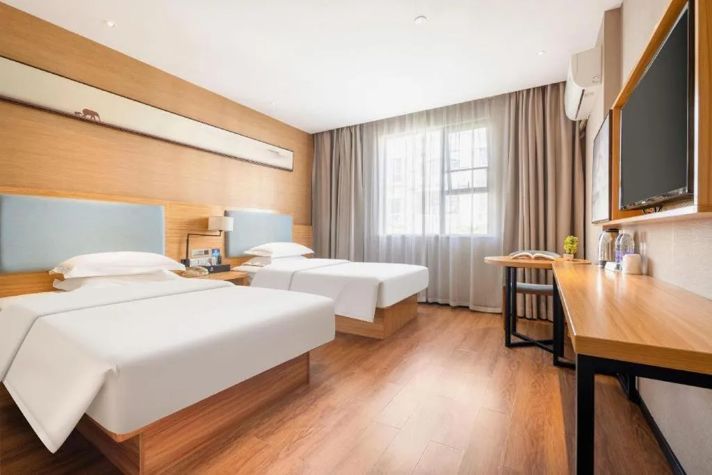 Bed in JTOUR Inn Guigang Life Port High-speed Railway Station