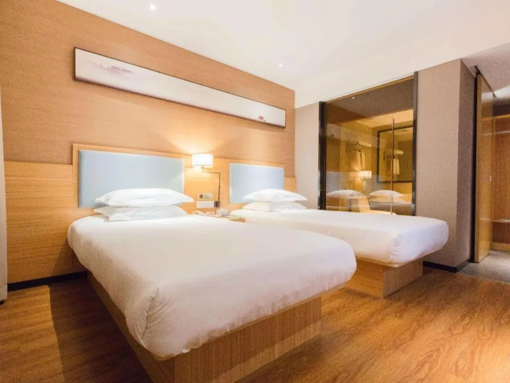 Bed in JTOUR Inn Guigang Life Port High-speed Railway Station