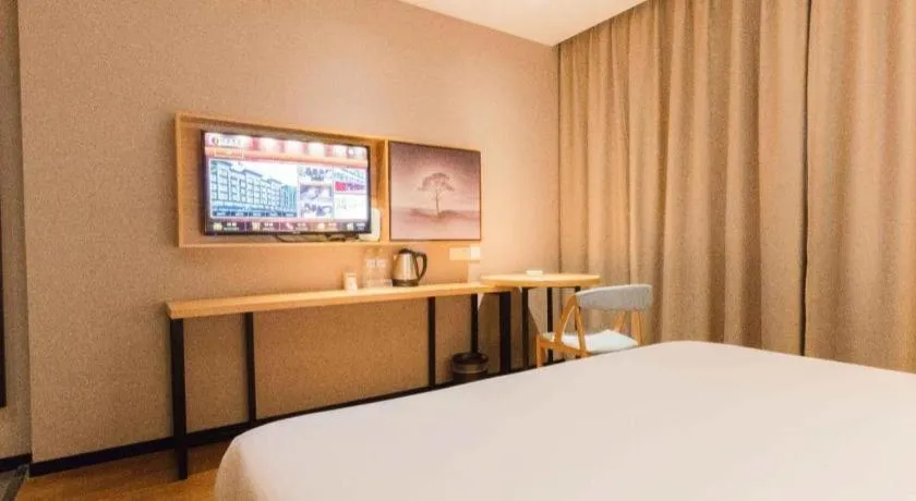 Bed in JTOUR Inn Guigang Life Port High-speed Railway Station