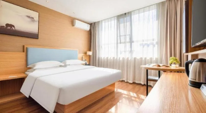 Bed in JTOUR Inn Guigang Life Port High-speed Railway Station