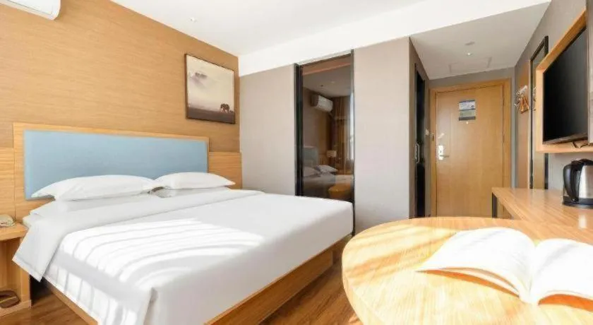 Bed in JTOUR Inn Guigang Life Port High-speed Railway Station