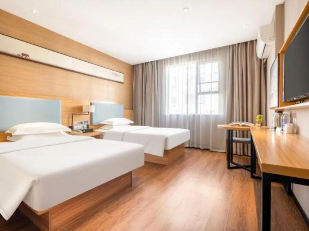 Bed in JTOUR Inn Guigang Life Port High-speed Railway Station