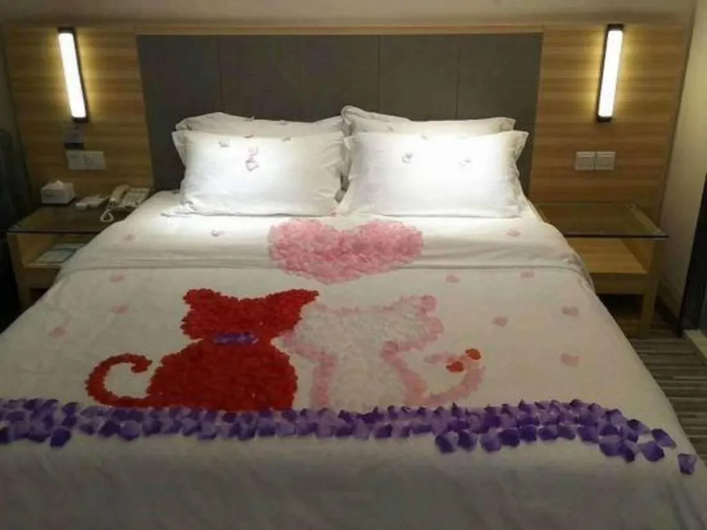 Bed in JTOUR Inn Guigang Life Port High-speed Railway Station