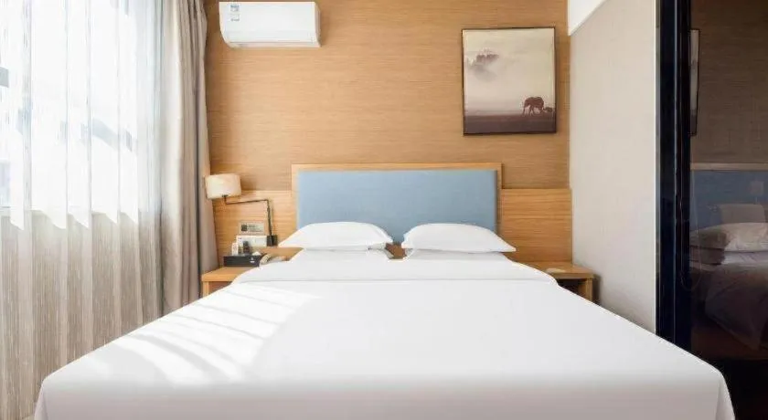 Bed in JTOUR Inn Guigang Life Port High-speed Railway Station