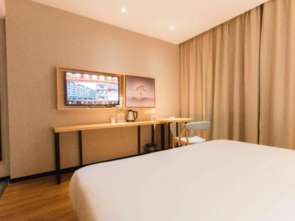 Bed in JTOUR Inn Guigang Life Port High-speed Railway Station