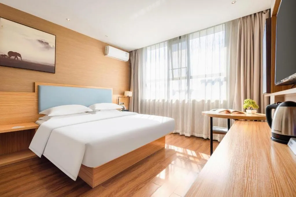 Bed in JTOUR Inn Guigang Life Port High-speed Railway Station