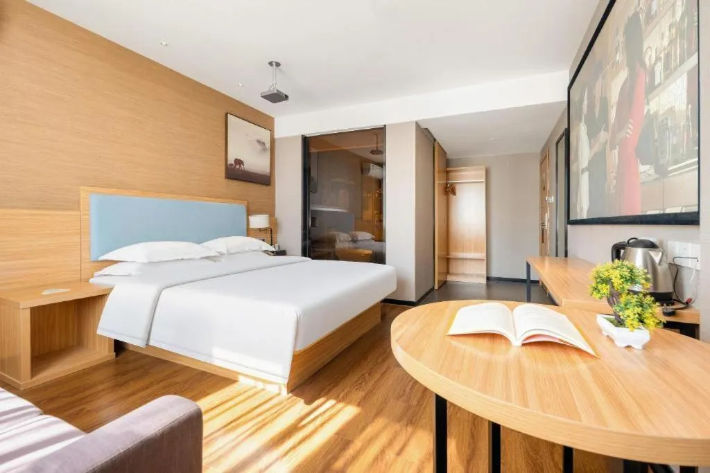 Bed in JTOUR Inn Guigang Life Port High-speed Railway Station