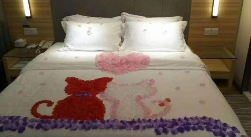 Bed in JTOUR Inn Guigang Life Port High-speed Railway Station