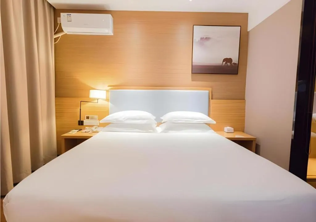 Bed in JTOUR Inn Guigang Life Port High-speed Railway Station