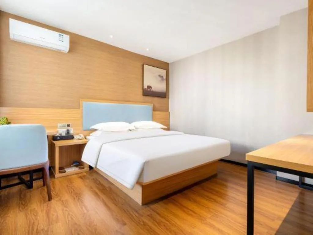 Bed in JTOUR Inn Guigang Life Port High-speed Railway Station