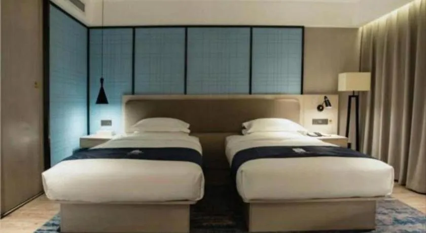 Bed in Echarm Hotel Jianshui Gucheng