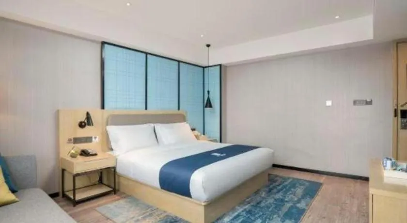 Bed in Echarm Hotel Jianshui Gucheng