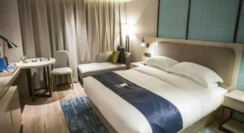 Bed in Echarm Hotel Jianshui Gucheng