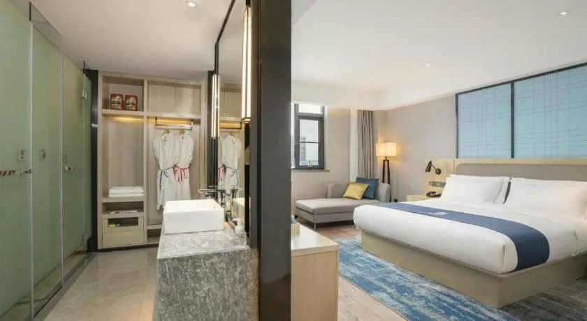 Bed in Echarm Hotel Jianshui Gucheng