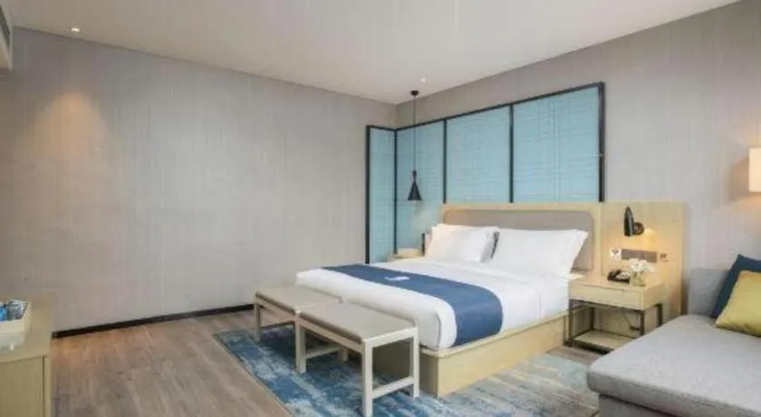 Bed in Echarm Hotel Jianshui Gucheng