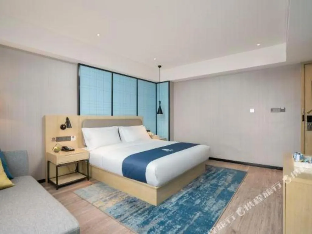 Bed in Echarm Hotel Jianshui Gucheng