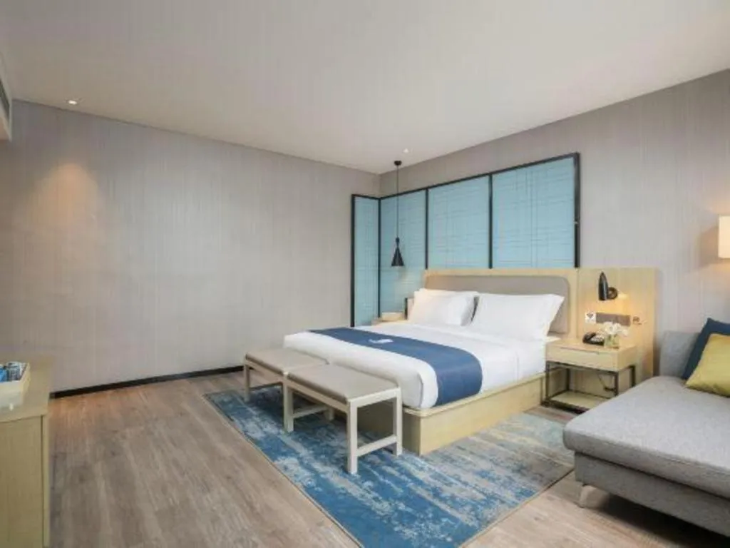 Bed in Echarm Hotel Jianshui Gucheng