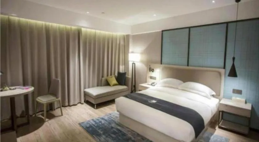 Bed in Echarm Hotel Jianshui Gucheng