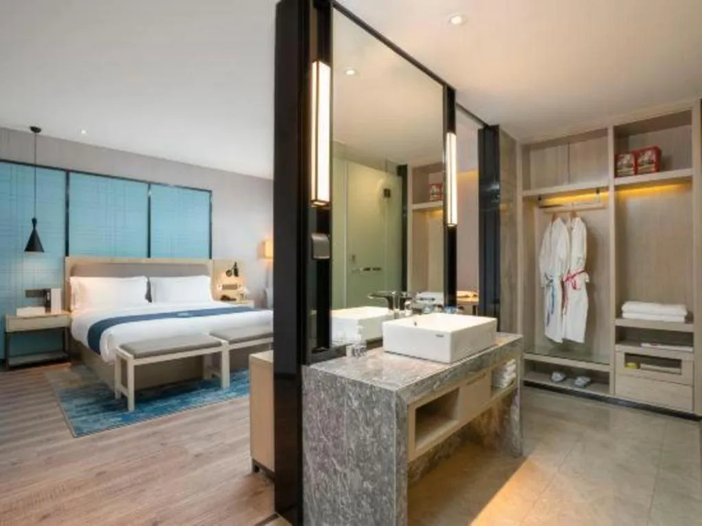 Bed in Echarm Hotel Jianshui Gucheng