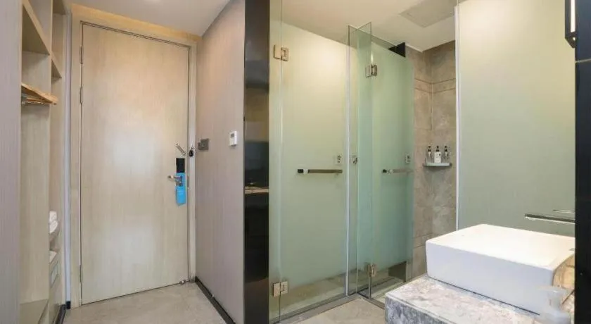 Bed in Echarm Hotel Jianshui Gucheng