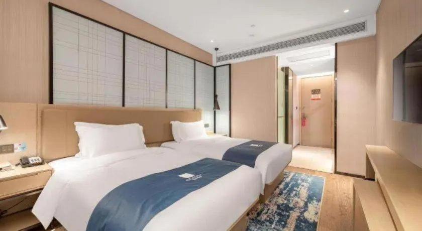 Bed in Echarm Hotel Binzhou Boxing Yinzuo