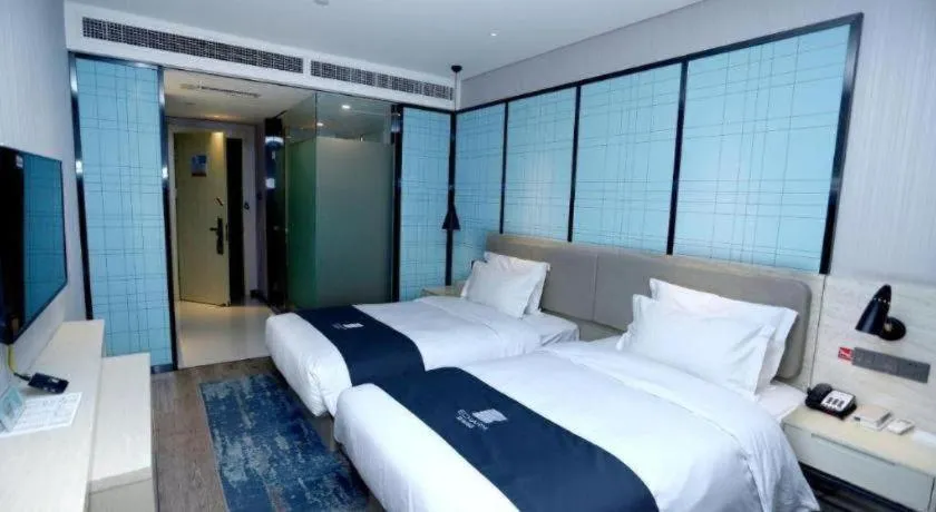 Bed in Echarm Hotel Binzhou Boxing Yinzuo