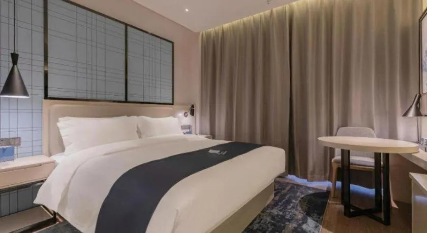 Bed in Echarm Hotel Binzhou Boxing Yinzuo