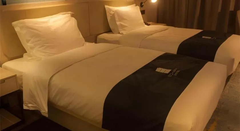 Bed in Echarm Hotel Binzhou Boxing Yinzuo