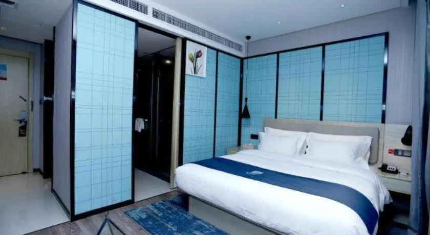 Bed in Echarm Hotel Binzhou Boxing Yinzuo