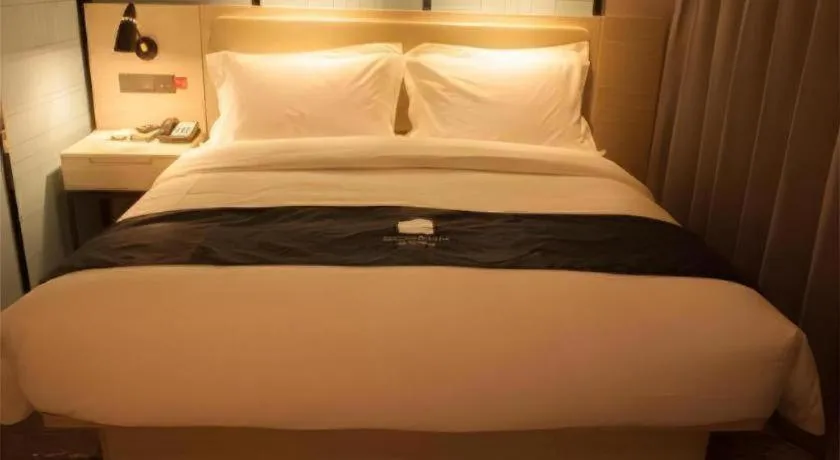 Bed in Echarm Hotel Binzhou Boxing Yinzuo