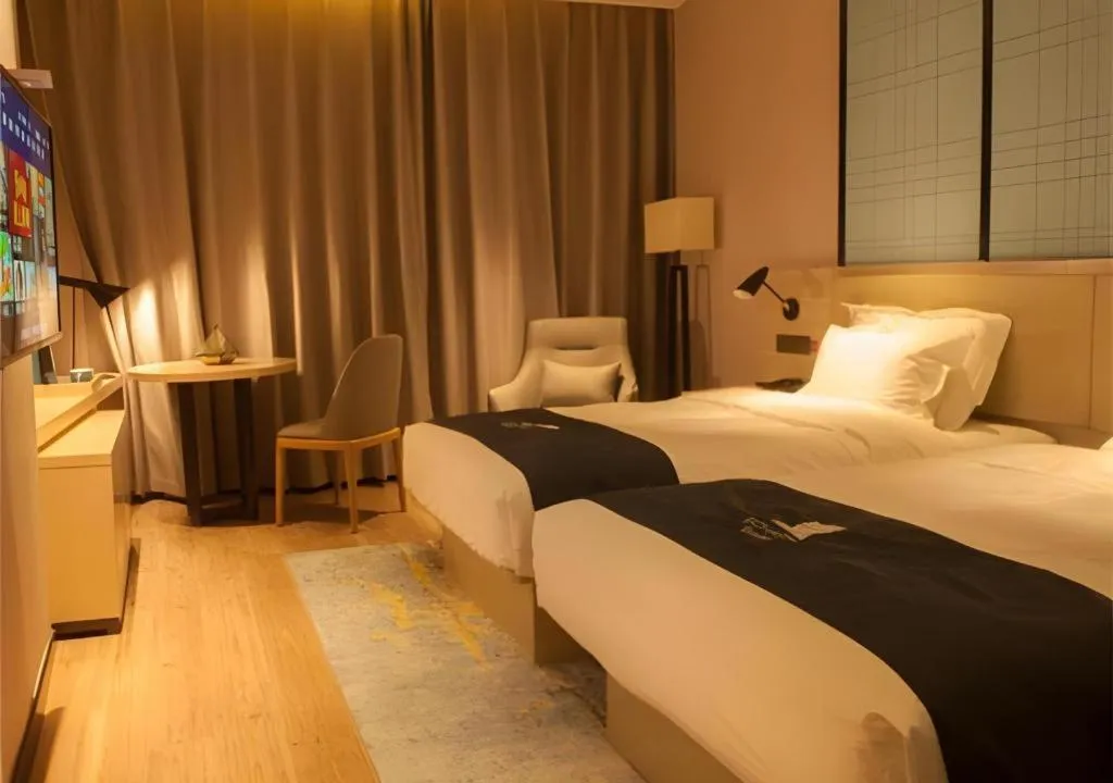 Bed in Echarm Hotel Binzhou Boxing Yinzuo
