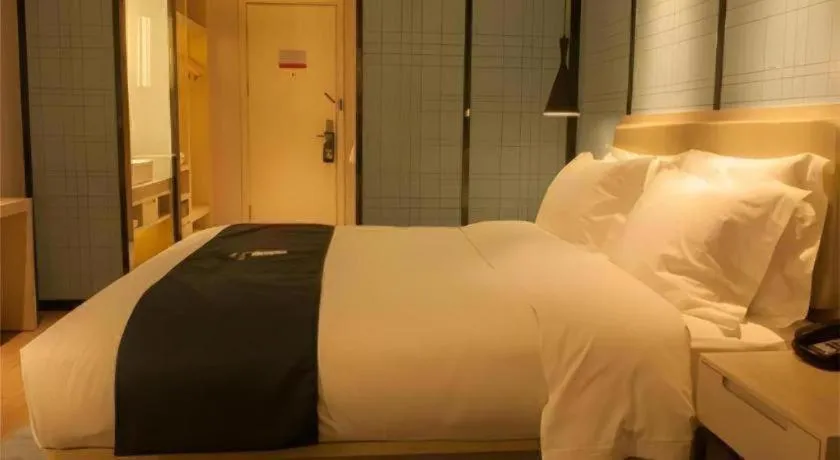 Bed in Echarm Hotel Binzhou Boxing Yinzuo