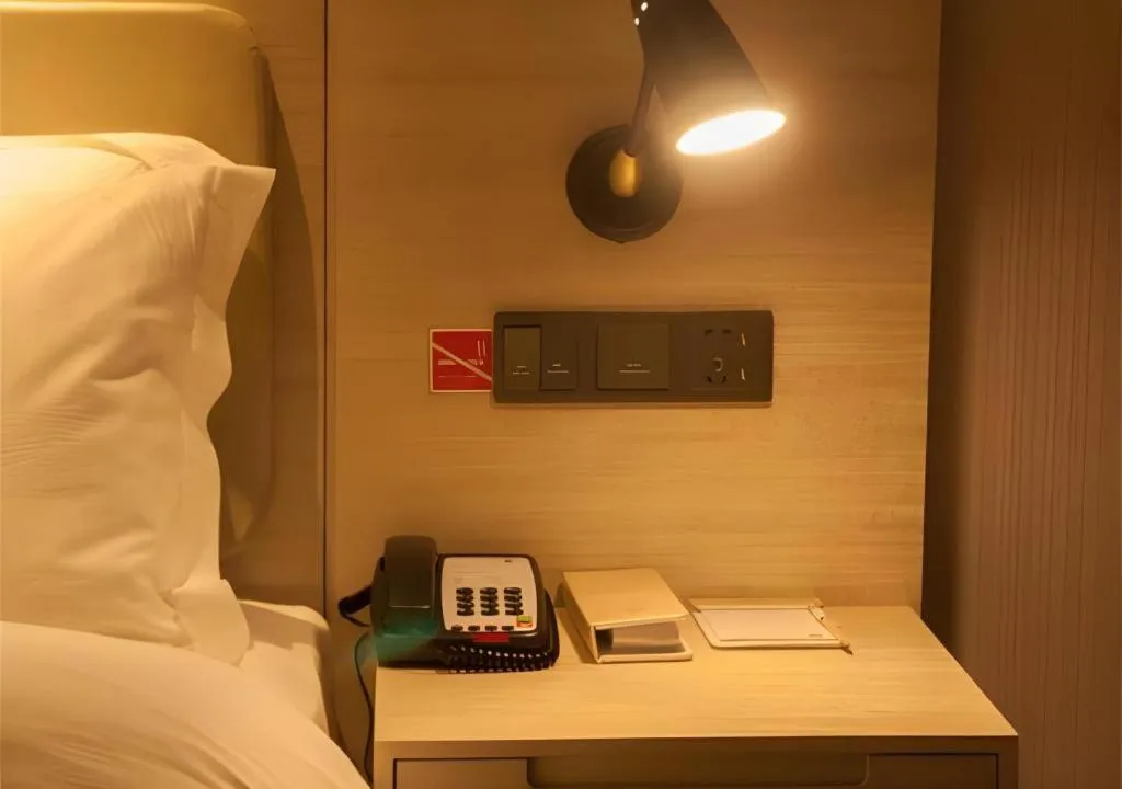 Bed in Echarm Hotel Binzhou Boxing Yinzuo