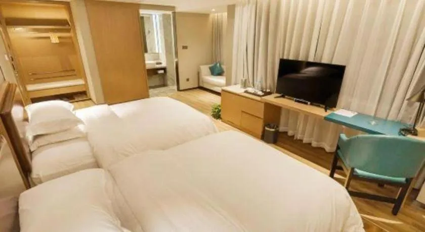 Bed in Borrman Hotel Liuzhou Guizhong Avenue Liugao