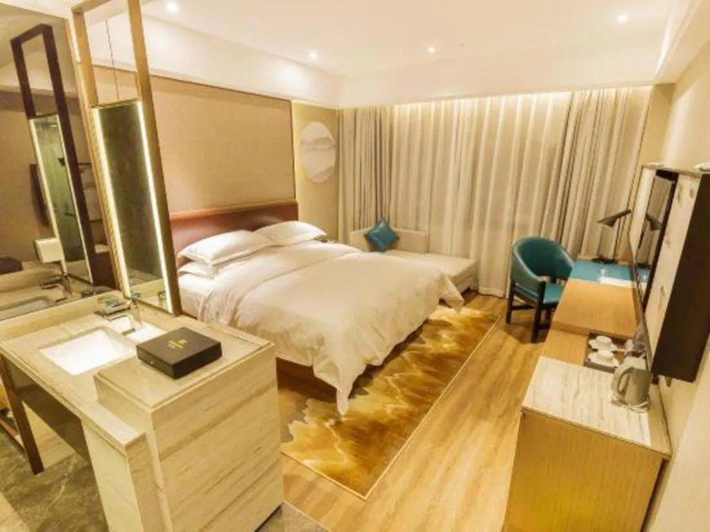 Bed in Borrman Hotel Liuzhou Guizhong Avenue Liugao