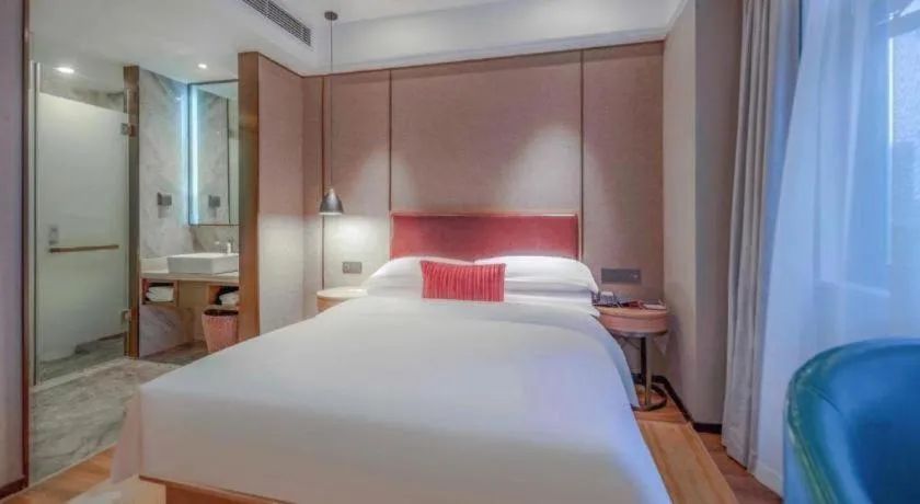 Bed in Borrman Hotel Liuzhou Guizhong Avenue Liugao