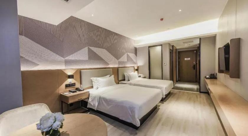 Bed in Borrman Hotel Liuzhou Guizhong Avenue Liugao