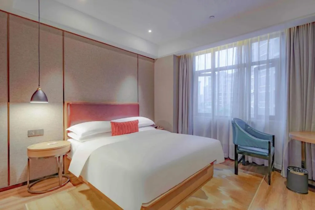Bed in Borrman Hotel Liuzhou Guizhong Avenue Liugao
