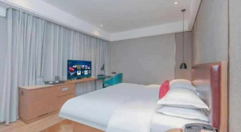 Bed in Borrman Hotel Liuzhou Guizhong Avenue Liugao