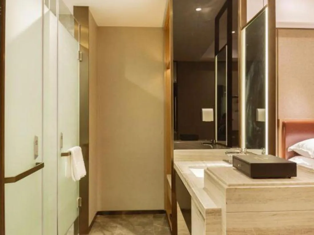 Bed in Borrman Hotel Liuzhou Guizhong Avenue Liugao