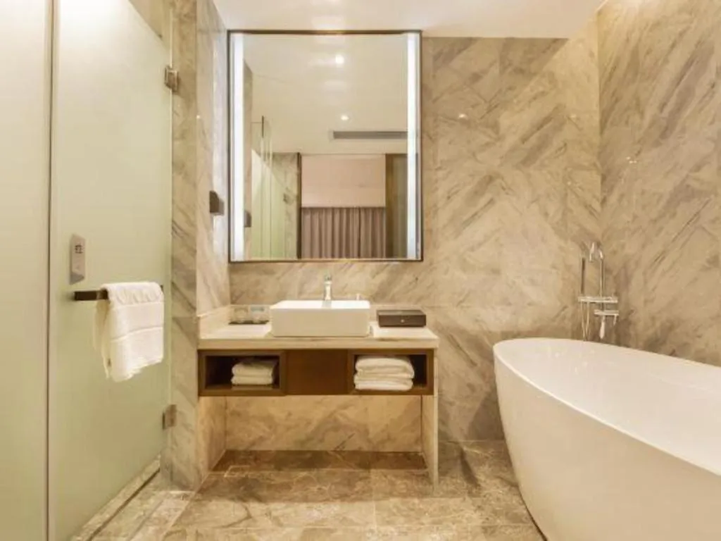 Bed in Borrman Hotel Liuzhou Guizhong Avenue Liugao