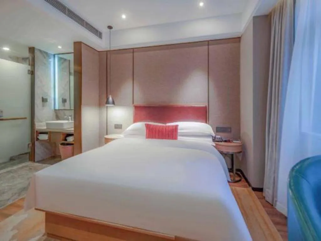 Bed in Borrman Hotel Liuzhou Guizhong Avenue Liugao