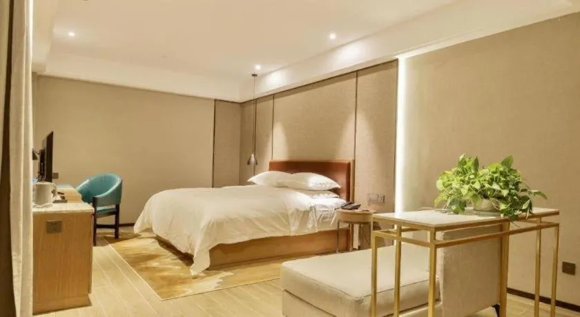 Bed in Borrman Hotel Liuzhou Guizhong Avenue Liugao