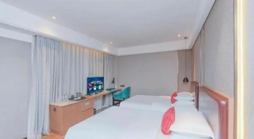 Bed in Borrman Hotel Liuzhou Guizhong Avenue Liugao